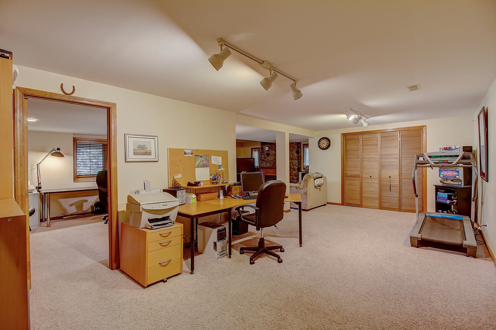 35W522 Miller Road Algonquin, IL 60102 - Photo 34 of 63 a view of a workspace with furniture and a livingroom