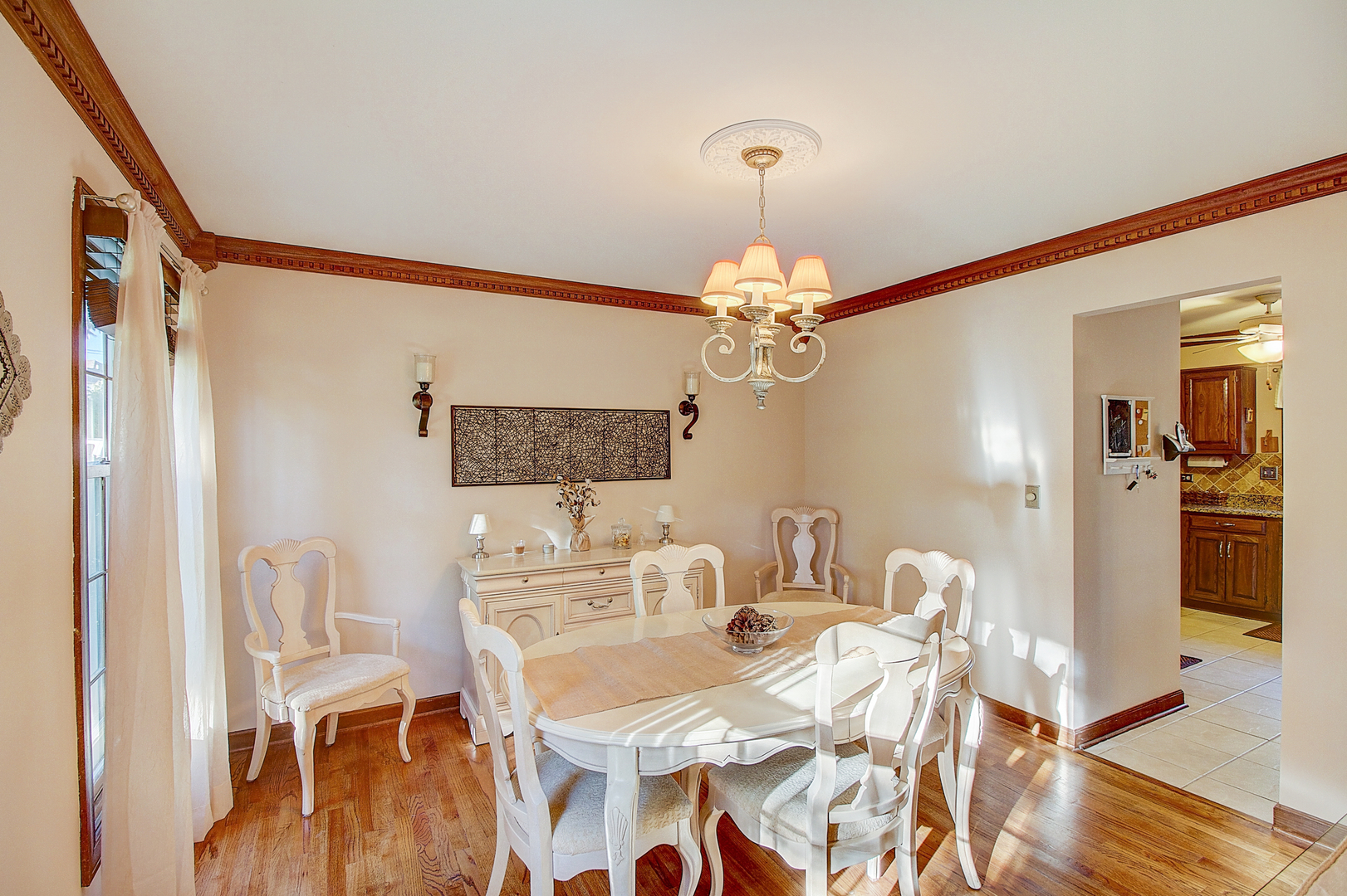 35W522 Miller Road Algonquin, IL 60102 - Photo 8 of 63 a view of a dining room with furniture and wooden floor