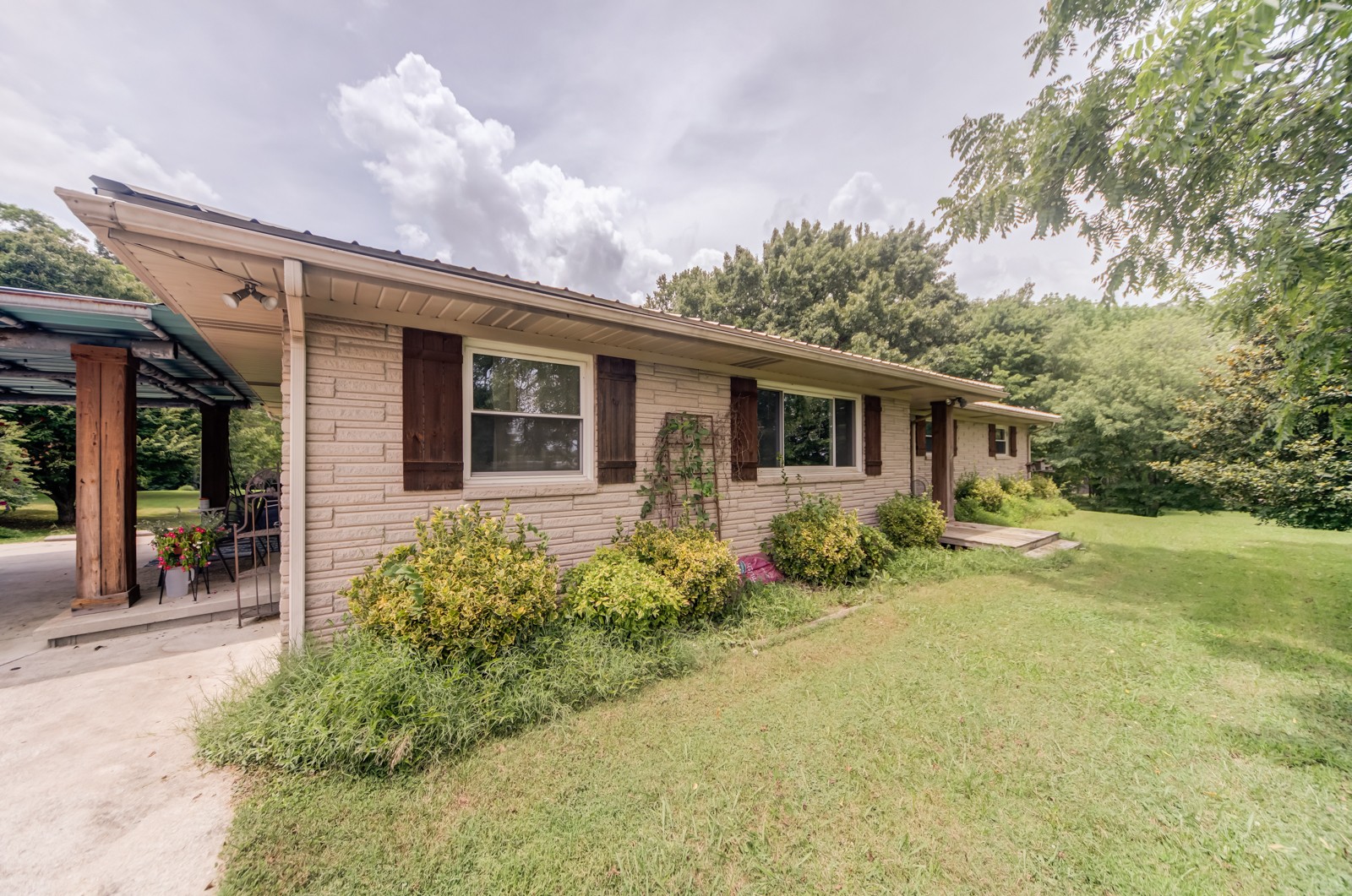 1353 Academy Road Portland, TN 37148 - Photo 2 of 35 front view of a house with a yard