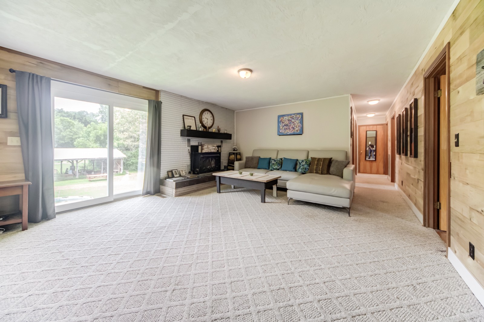 1353 Academy Road Portland, TN 37148 - Photo 14 of 35 a living room with furniture and a large window