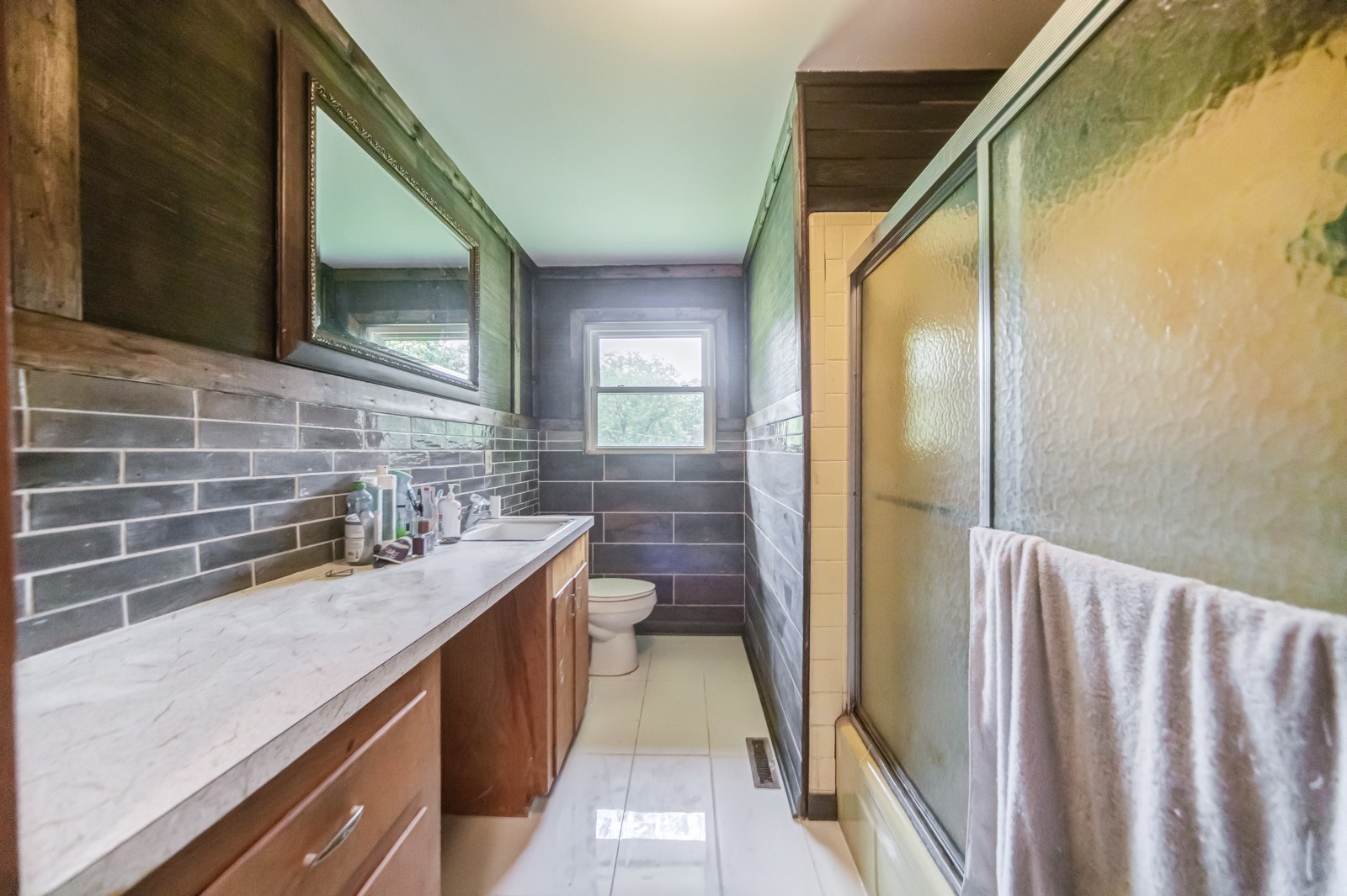 1353 Academy Road Portland, TN 37148 - Photo 18 of 35 a bathroom with a sink a toilet and a mirror