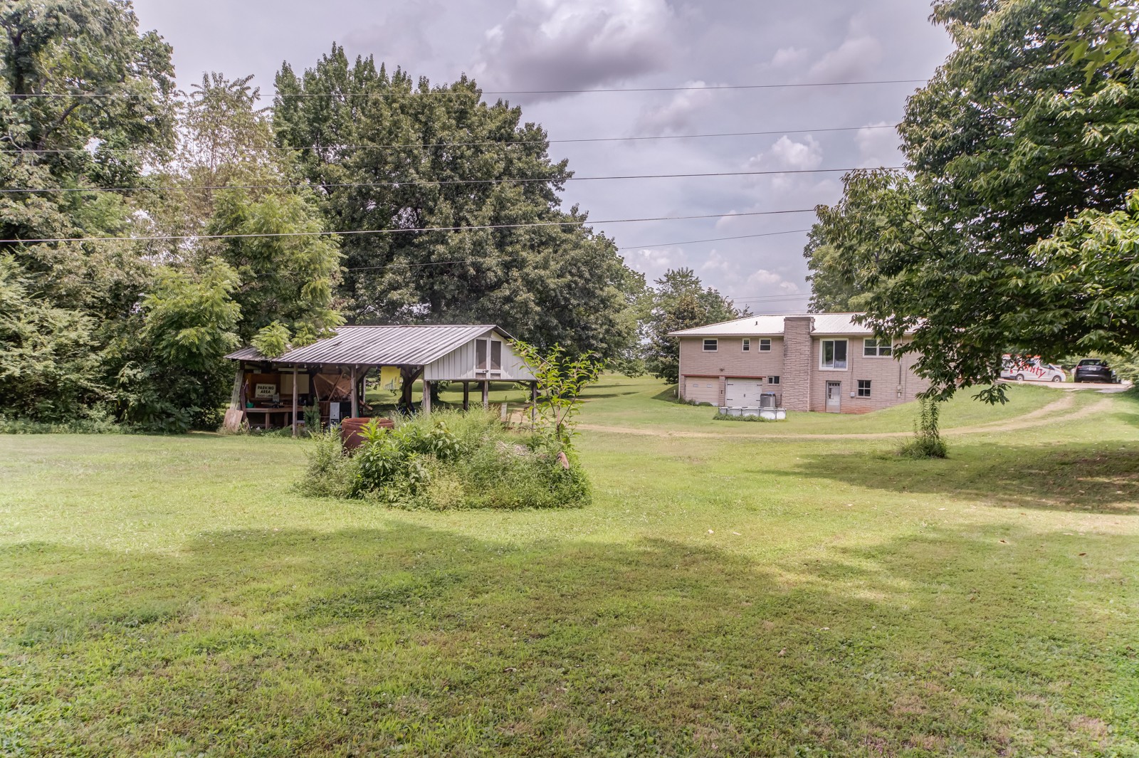 1353 Academy Road Portland, TN 37148 - Photo 25 of 35 a view of a house with a yard