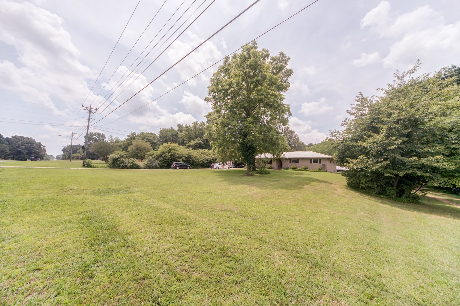 1353 Academy Road Portland, TN 37148 - Photo 31 of 35 a view of a swimming pool and trees in the background