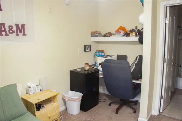 a view of workspace with lounge chair