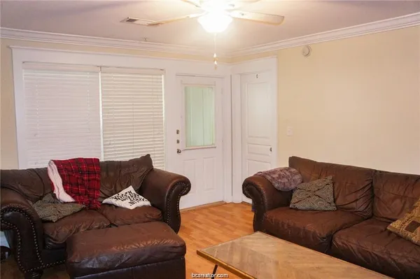 a living room with furniture and a couch