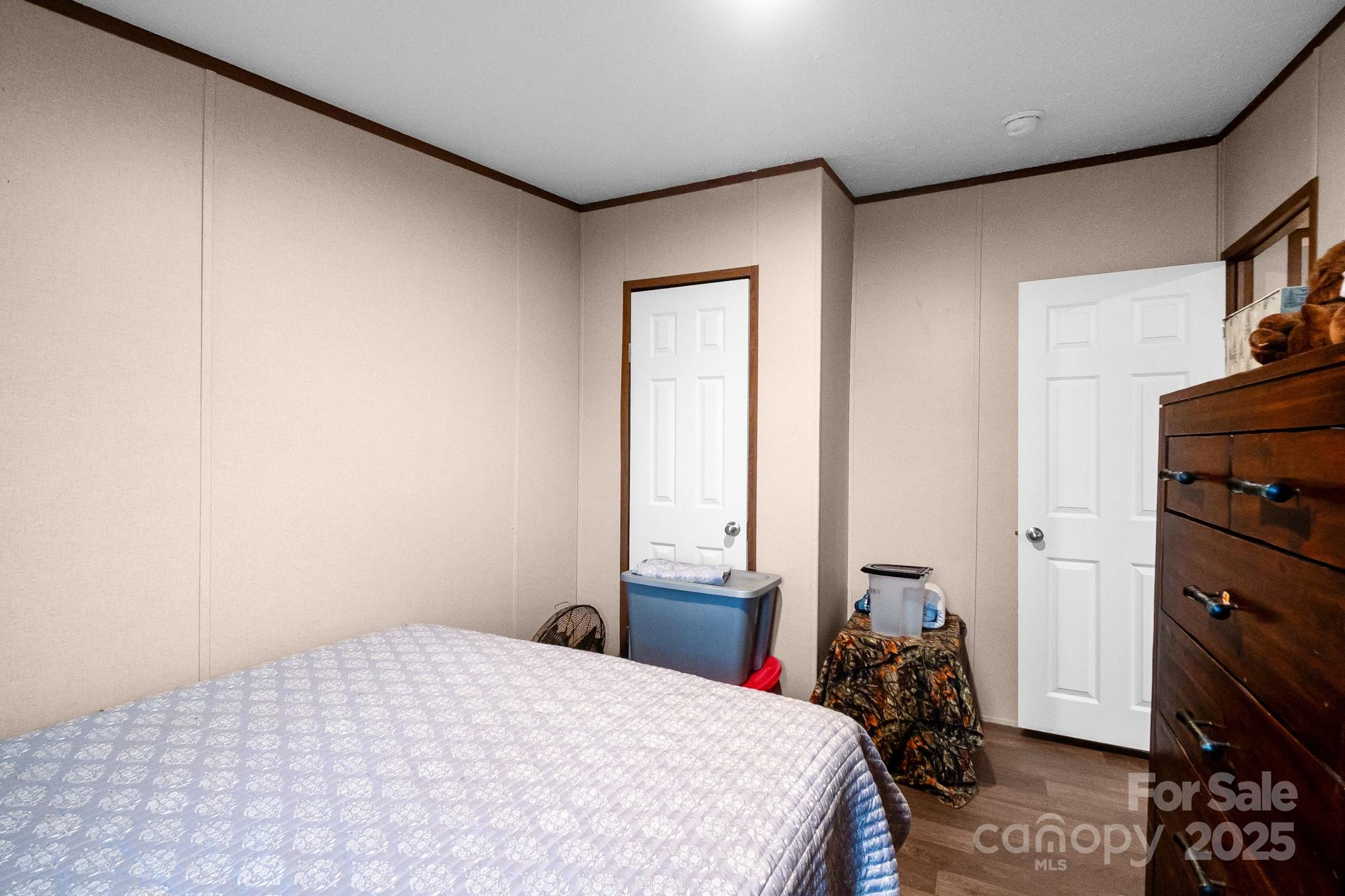 5263 Raleys Mill Road Bethune, SC 29009 - Photo 23 of 37 a bed sitting in a bedroom next to a window