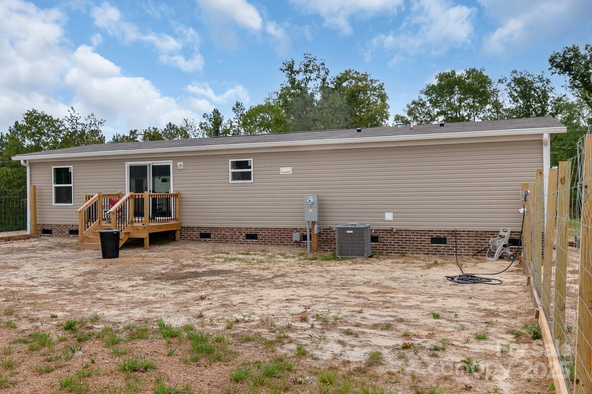 5263 Raleys Mill Road Bethune, SC 29009 - Photo 33 of 37 a view of a house with a patio