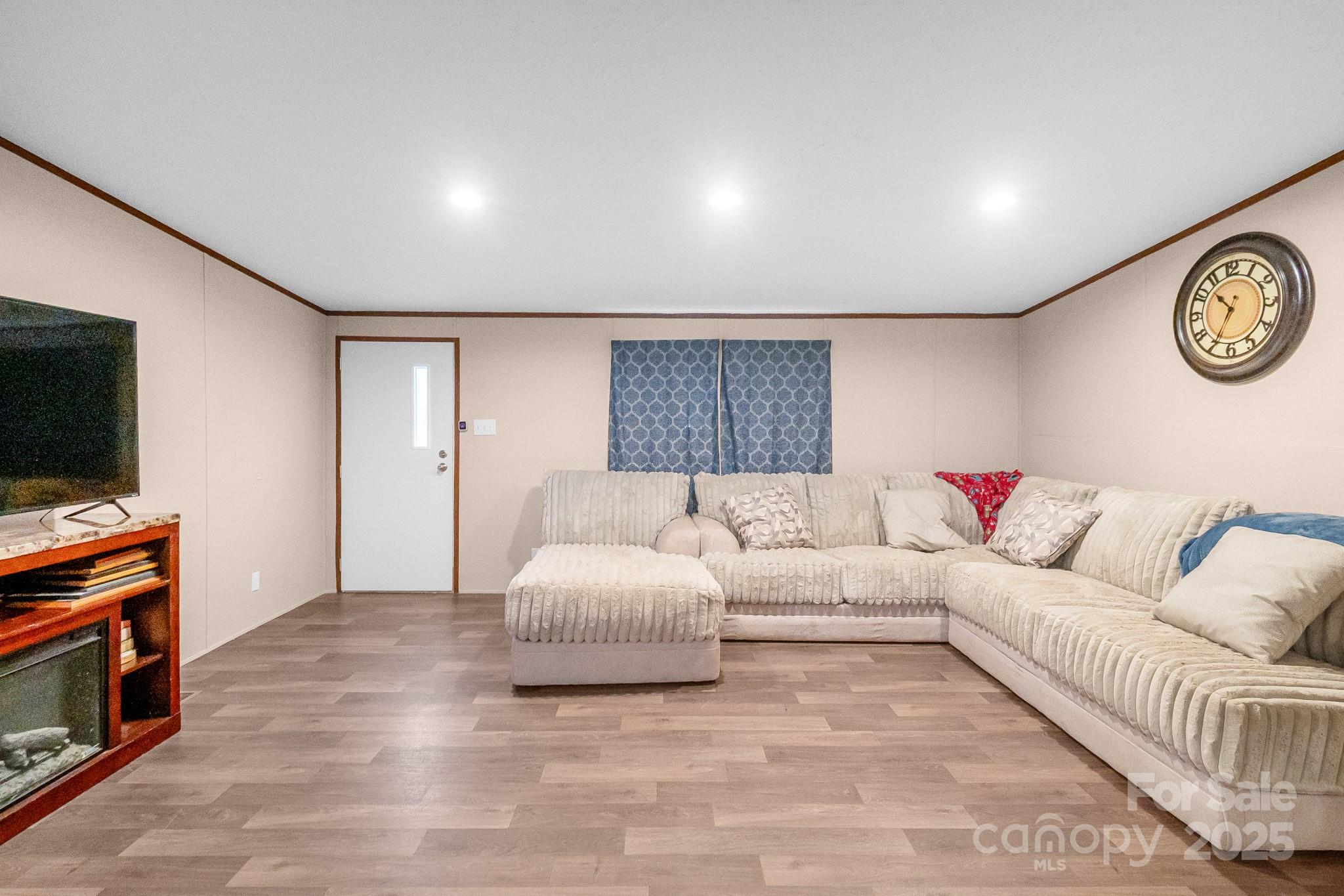 5263 Raleys Mill Road Bethune, SC 29009 - Photo 4 of 37 a living room with furniture and a flat screen tv