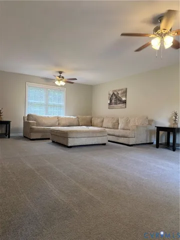a bedroom with bed and window