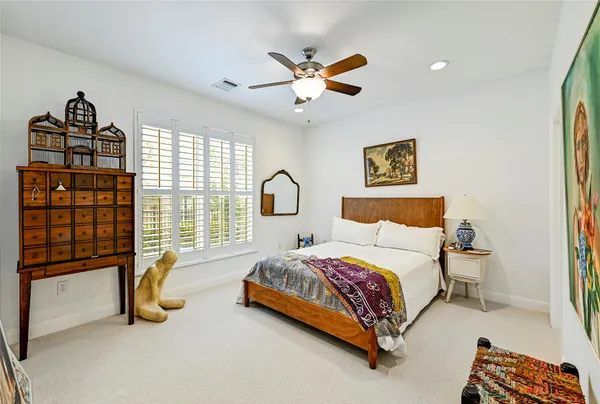 a view of washer and dryer with kitchen in the background