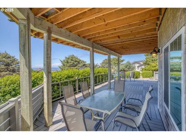 a view of a street with a tree in the background