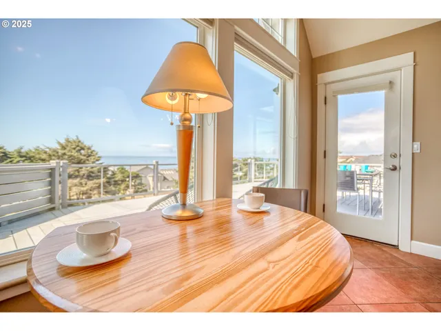 a bedroom with a bed and a wooden floor