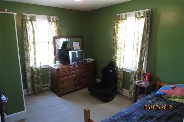 2082-2084 Palmer Road Three Rivers, MA 01080 - Photo 8 of 17 a room with furniture and a window