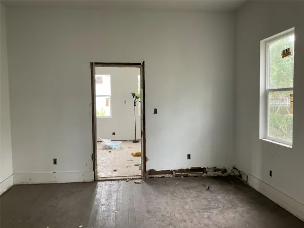 an empty room with an entryway