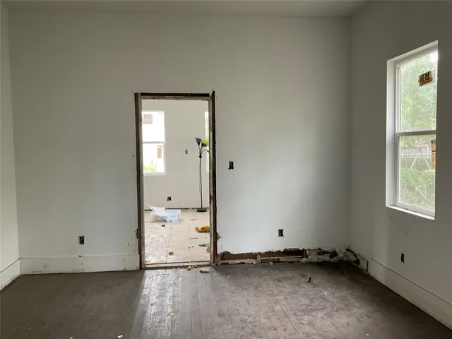 an empty room with an entryway