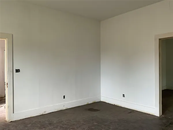 a living room with furniture a window and fireplace