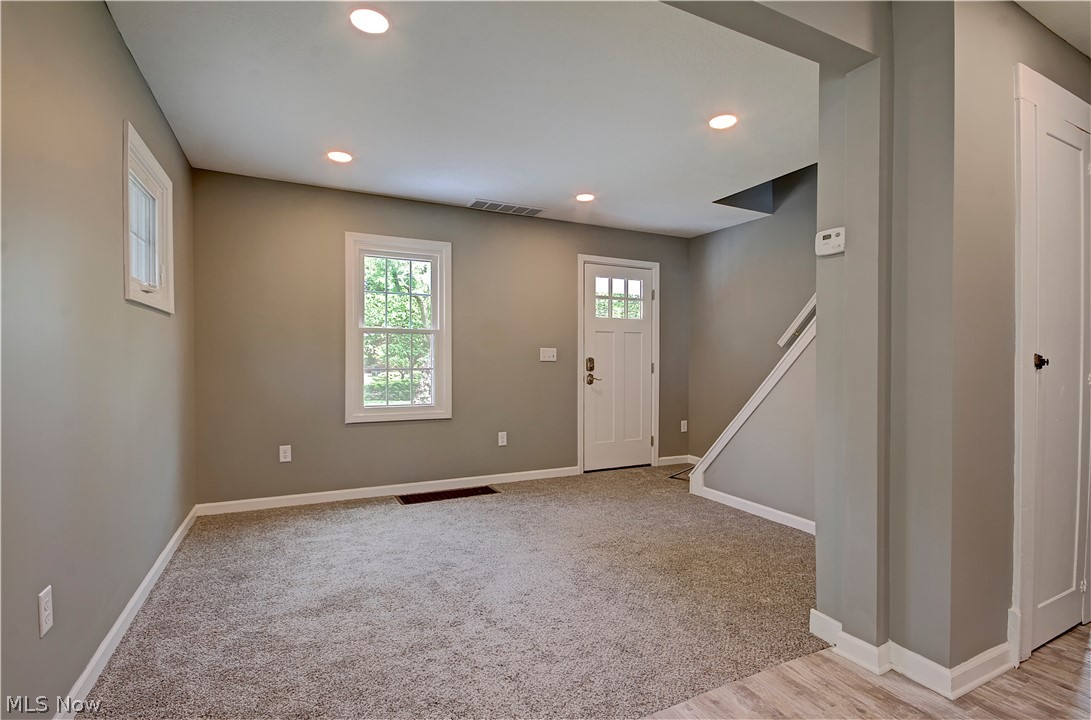 14507 Glencliffe Road Cleveland, OH 44111 - Photo 6 of 31 Foyer featuring light carpet