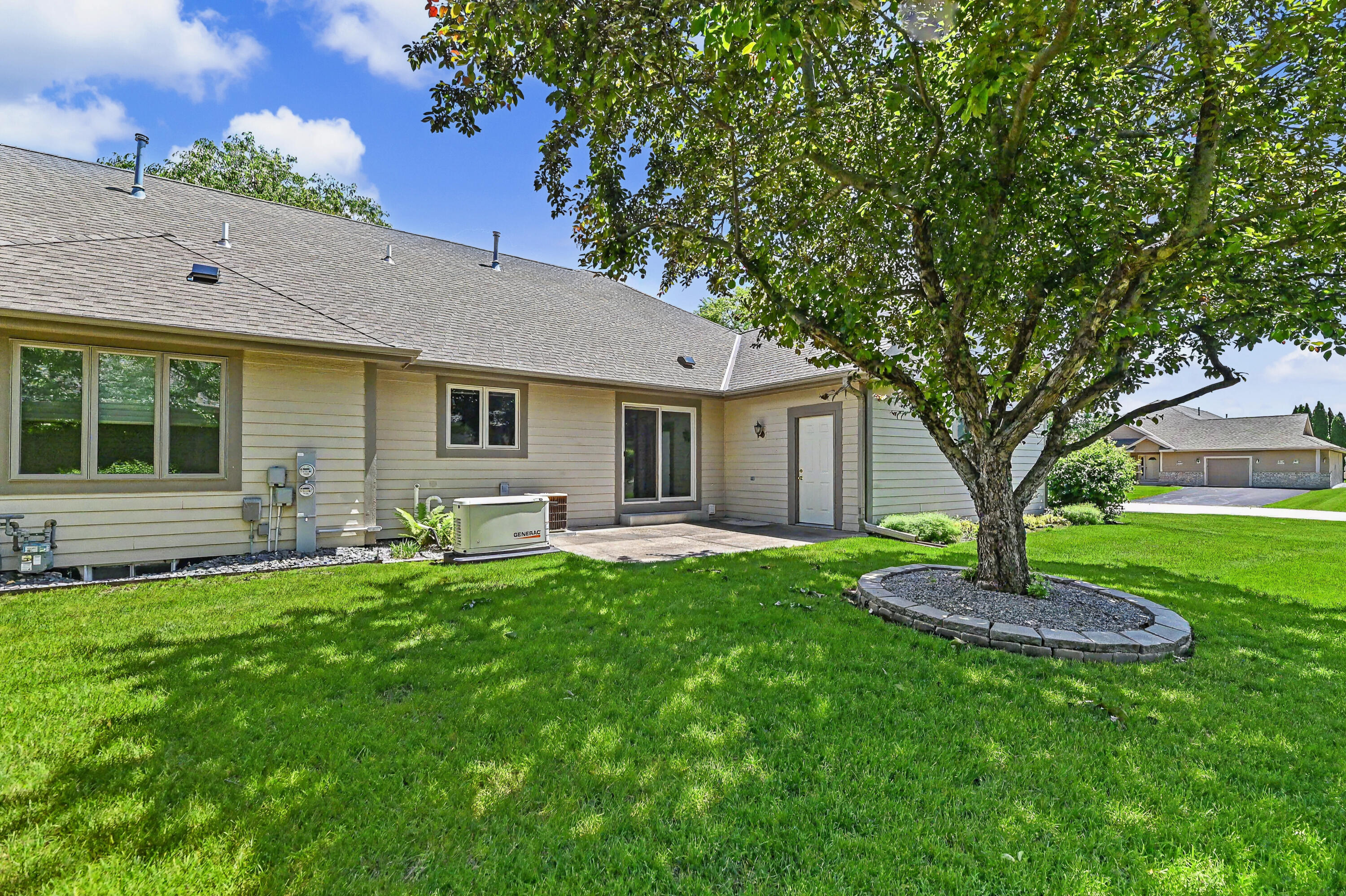 N22-w26492 Shooting Star Road, Unit 2 Pewaukee, WI 53072 - Photo 29 of 32 Rear exterior