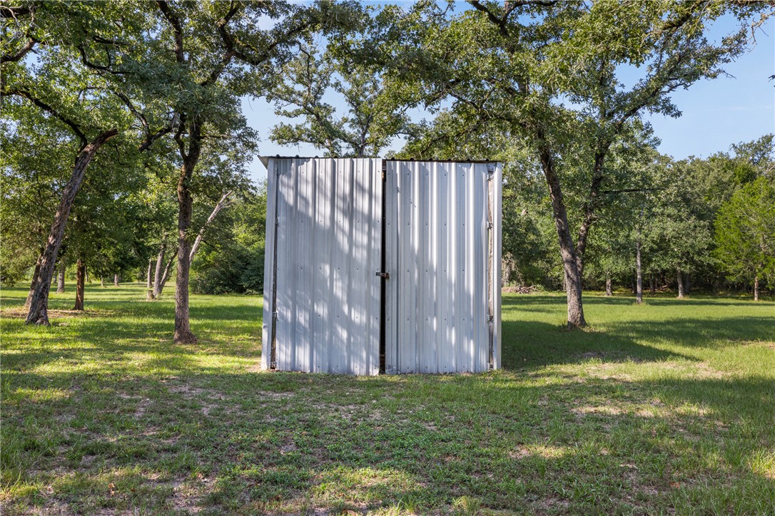 1.921-ac Cardinal Road Caldwell, TX 77836 - Photo 13 of 18 View of shed featuring view of scattered trees