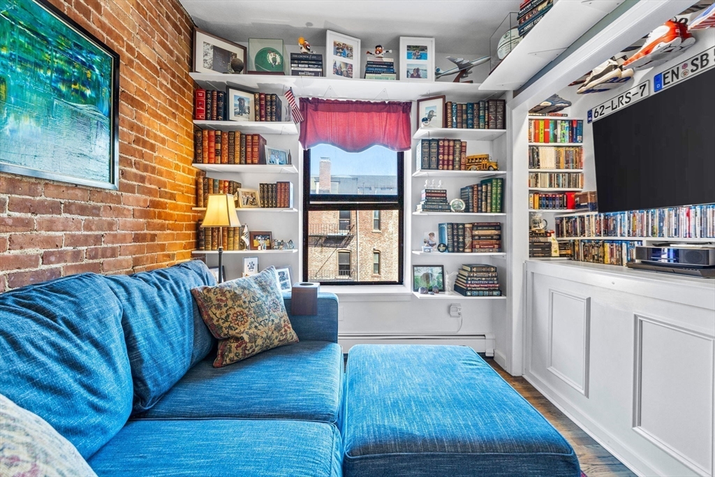 28 Worcester Square, Unit 4 Boston, MA 02118 - Photo 9 of 14 a living room with furniture and a flat screen tv