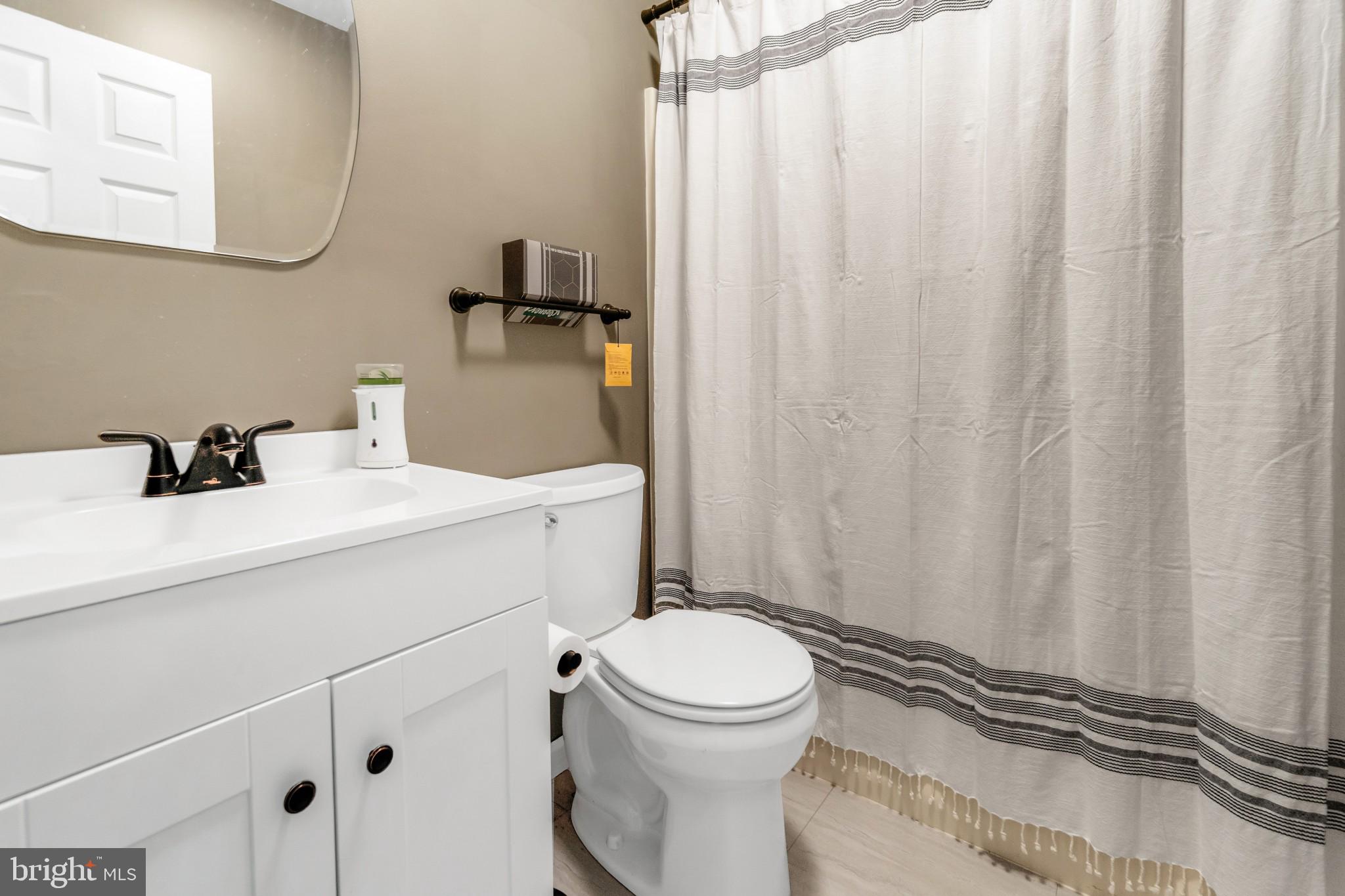 25610 Beauchamp Branch Road Denton, MD 21629 - Photo 14 of 64 hall guest full bath