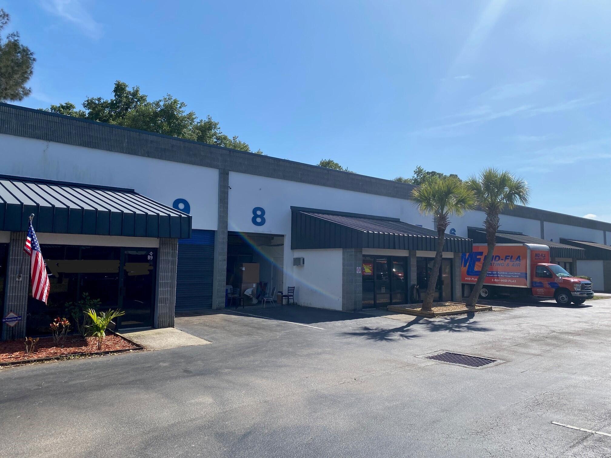 700 South John Rodes Boulevard, Unit B7 & B8 Melbourne, FL 32904 - Photo 10 of 10 a view of a street with cars