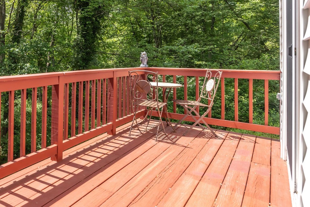 21 Vanderbelt Road Acton, MA 01720 - Photo 31 of 36 a view of balcony with wooden floor and outdoor space