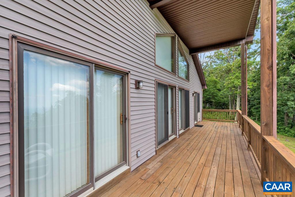 435 Elk Mountain Road Afton, VA 22920 - Photo 14 of 58 a view of backyard with a deck