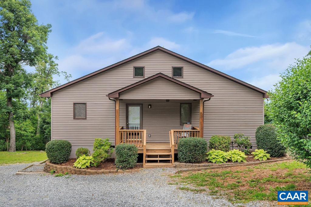 435 Elk Mountain Road Afton, VA 22920 - Photo 3 of 58 a front view of a house with a yard