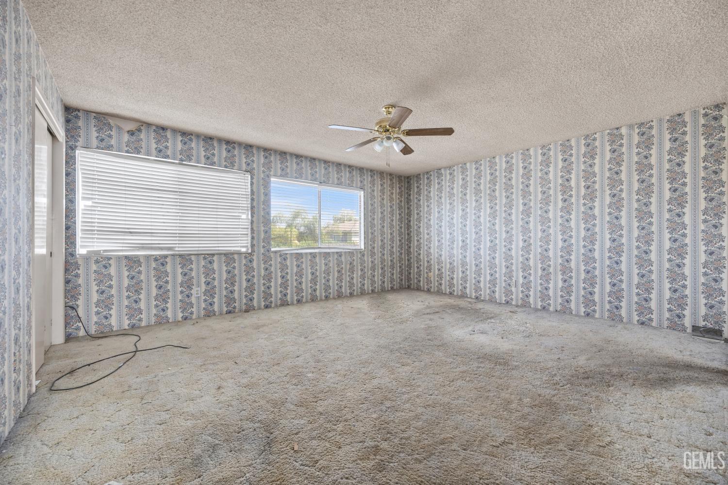 Undisclosed Address Bakersfield, CA 93309 - Photo 19 of 33 a view of an empty room with a window