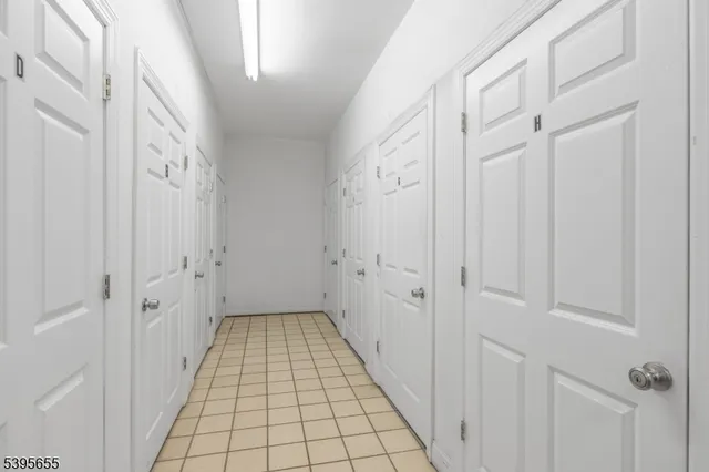 a view of a hallway with windows