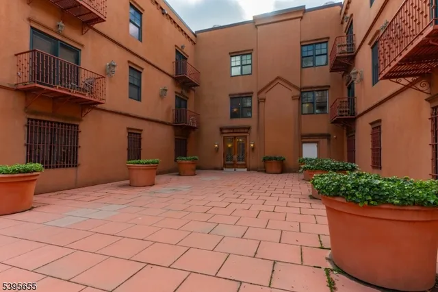 a view of a terrace with chairs