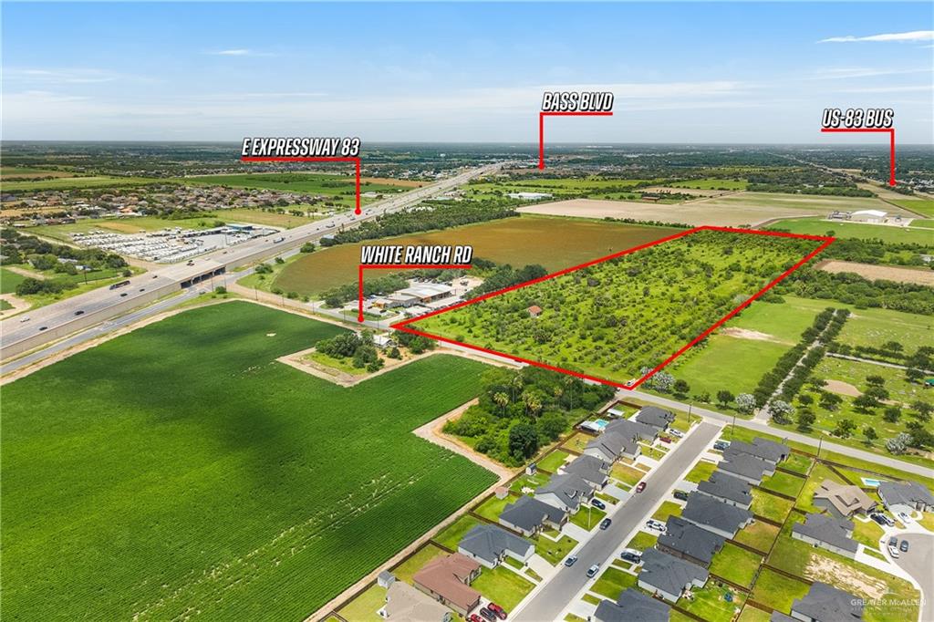 0 North White Ranch Road La Feria, TX 78559 - Photo 1 of 6 Expansive land parcel outlined in red, featuring varied vegetation
