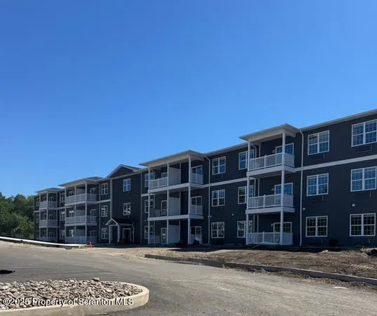 a view of an buildings with a street