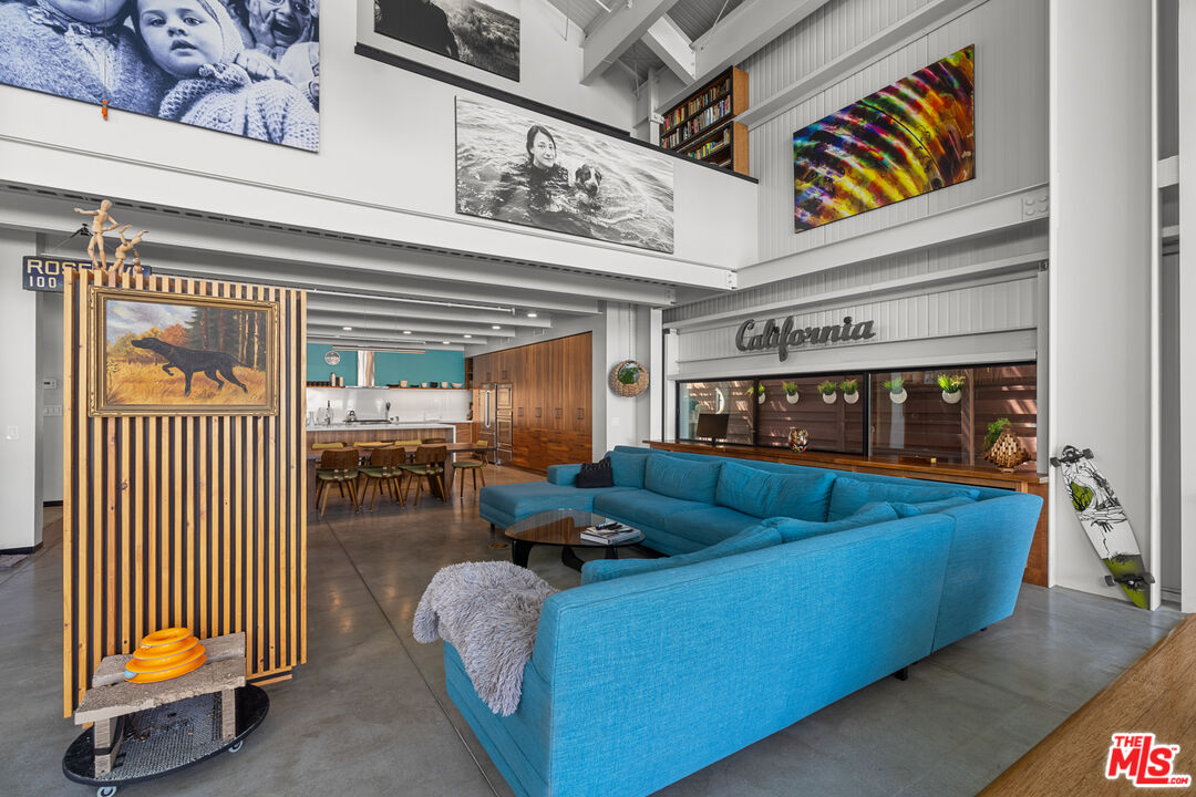 548 Rose Avenue Venice, CA 90291 - Photo 15 of 48 a living room with furniture and a ceiling fan