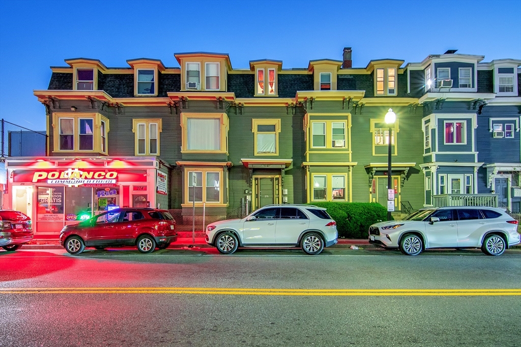 a car parked in front of a building