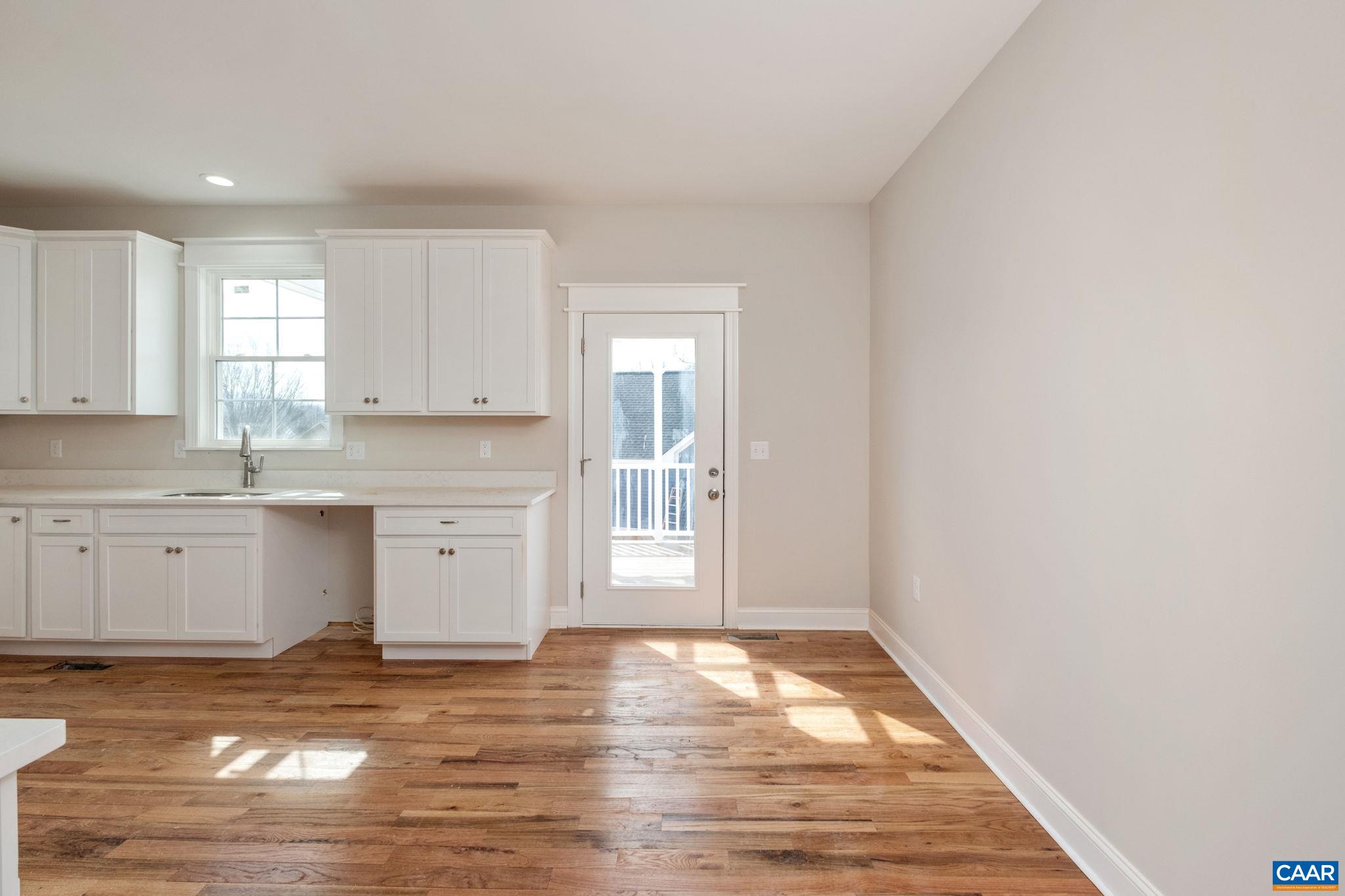 1004 High Point Court Waynesboro, VA 22980 - Photo 13 of 39 a view of a kitchen with wooden floor and a sink