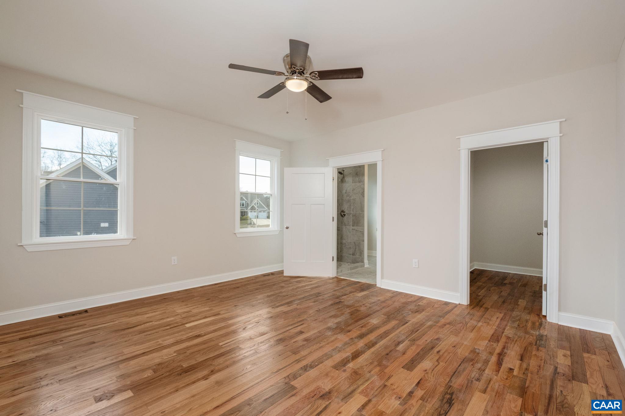 1004 High Point Court Waynesboro, VA 22980 - Photo 14 of 39 a view of empty room with wooden floor and fan