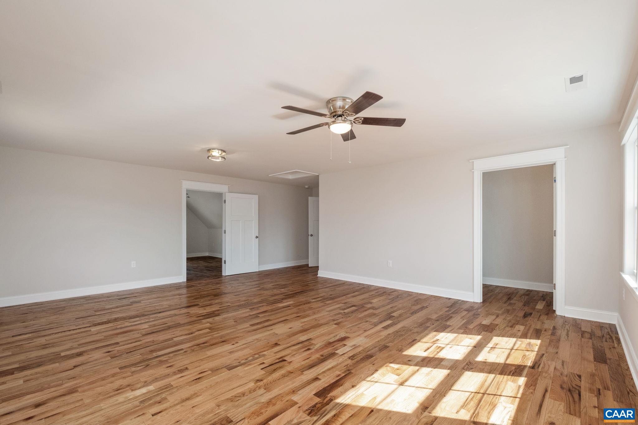 1004 High Point Court Waynesboro, VA 22980 - Photo 20 of 39 a view of an empty room with a window and wooden floor