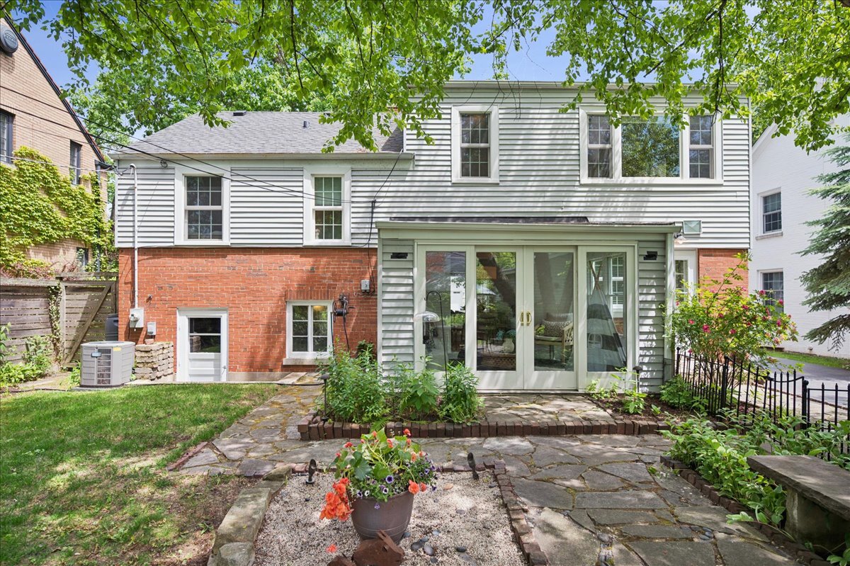 712 Juniper Road Glenview, IL 60025 - Photo 23 of 33 front view of a brick house with a yard