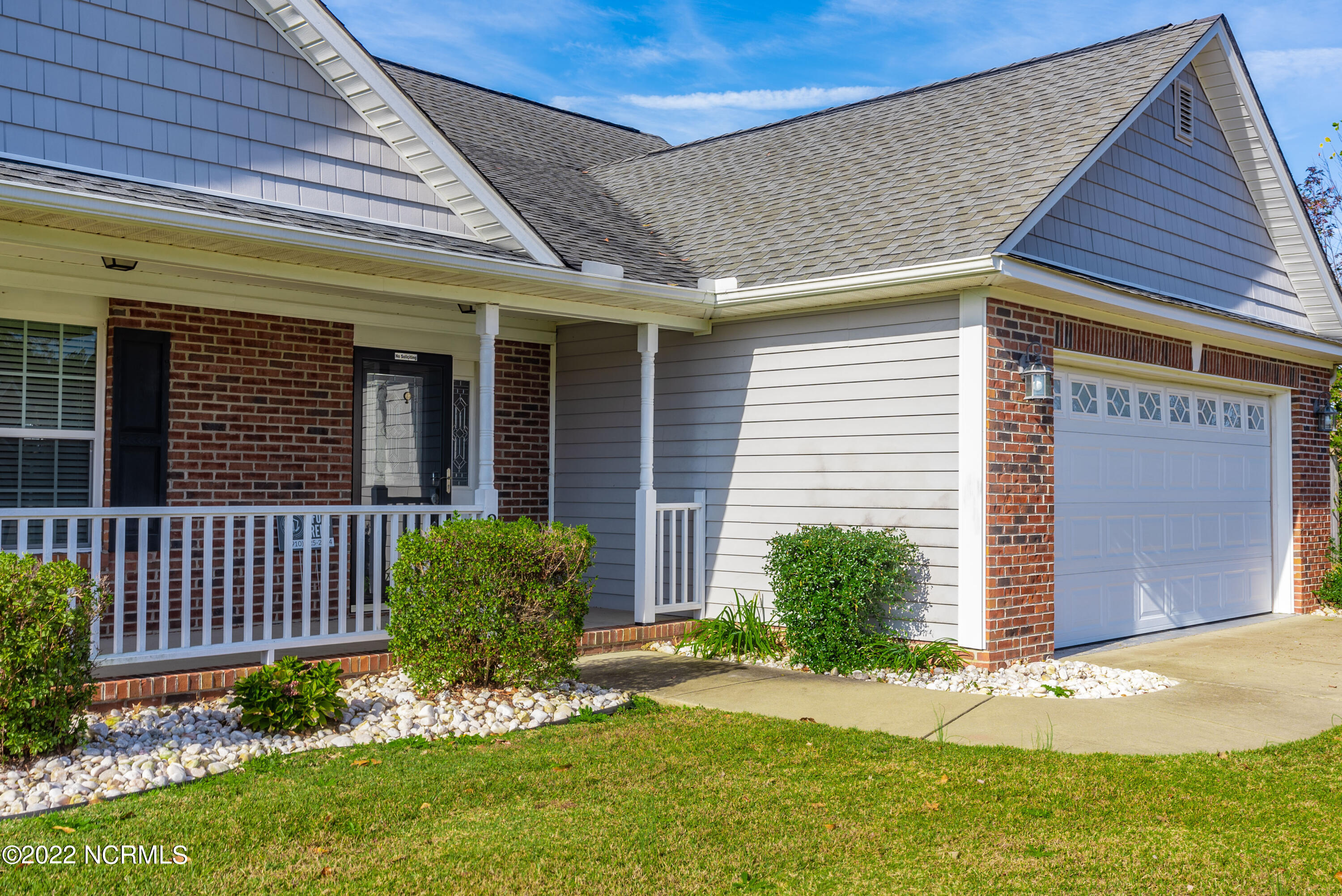 389 Livingston Drive Raeford, NC 28376 - Photo 2 of 37 Walkway, flower bed