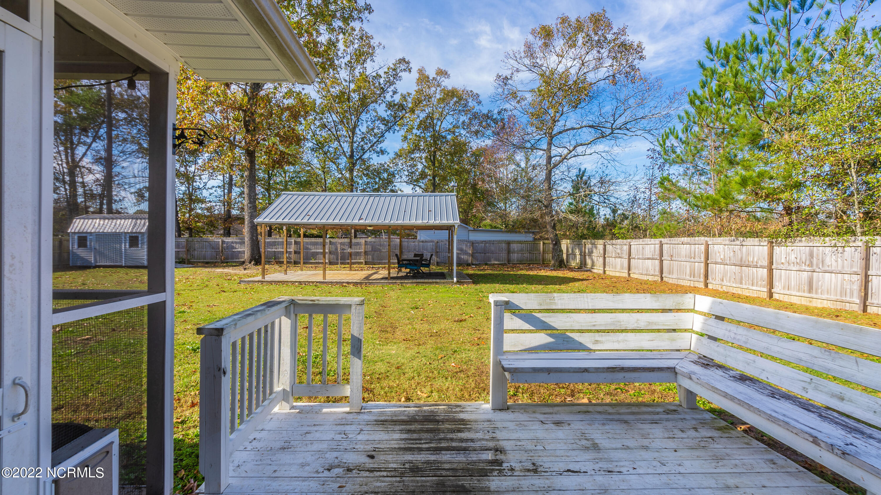389 Livingston Drive Raeford, NC 28376 - Photo 28 of 37 Deck with Bench Seating