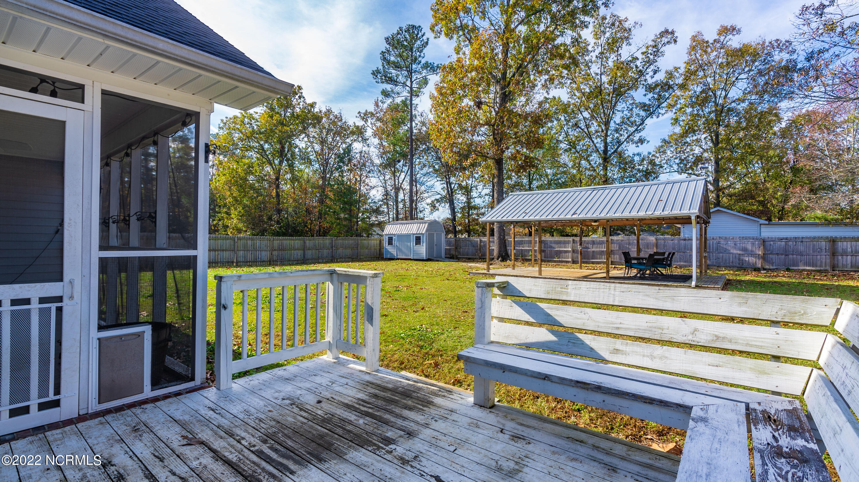 389 Livingston Drive Raeford, NC 28376 - Photo 29 of 37 Deck with Bench Seating