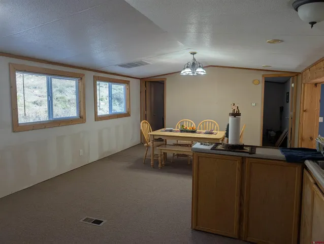 a room with gym equipment and a window
