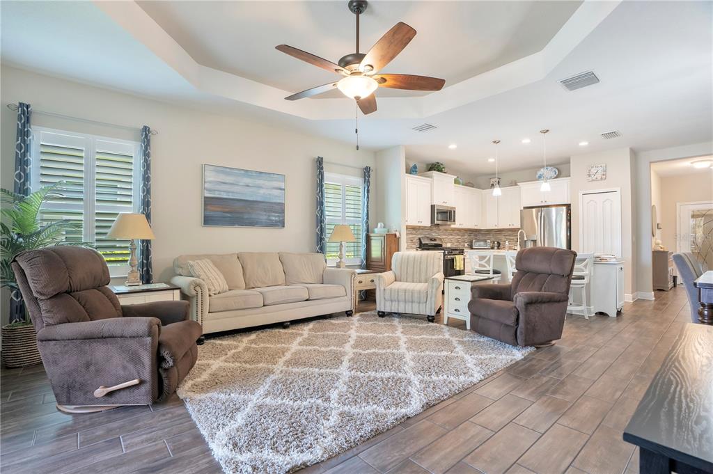 13541 Circa Crossing Drive Lithia, FL 33547 - Photo 19 of 52 a living room with furniture and a large window