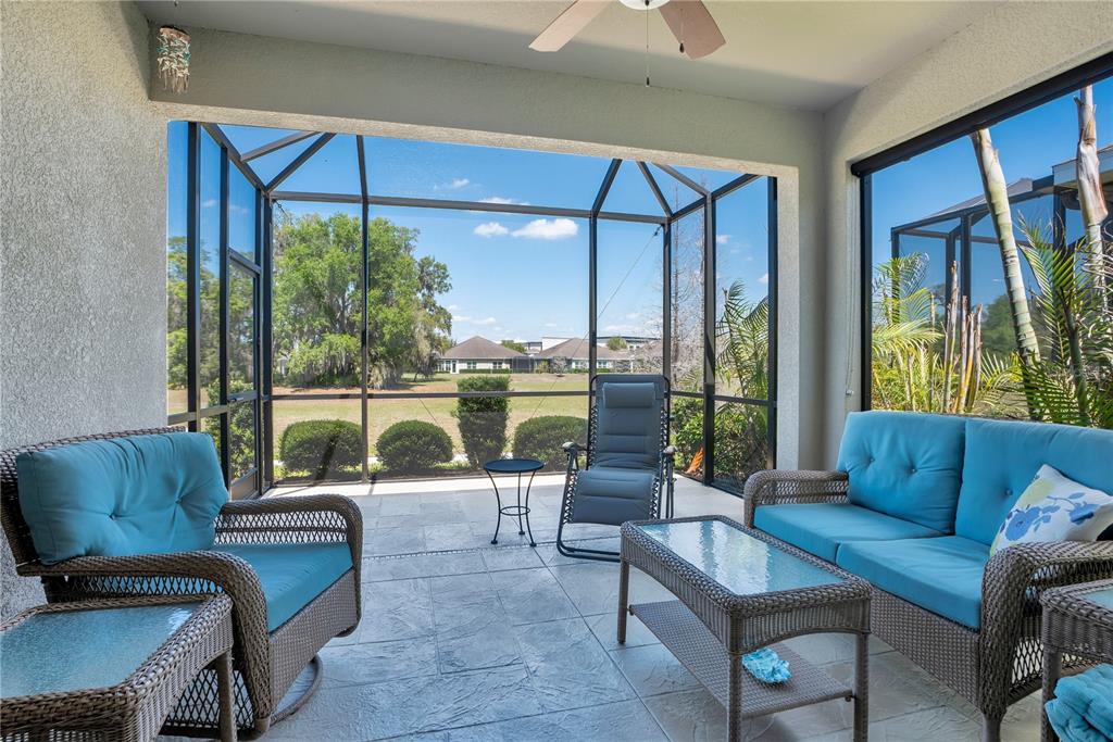 13541 Circa Crossing Drive Lithia, FL 33547 - Photo 24 of 52 a living room with furniture and a large window