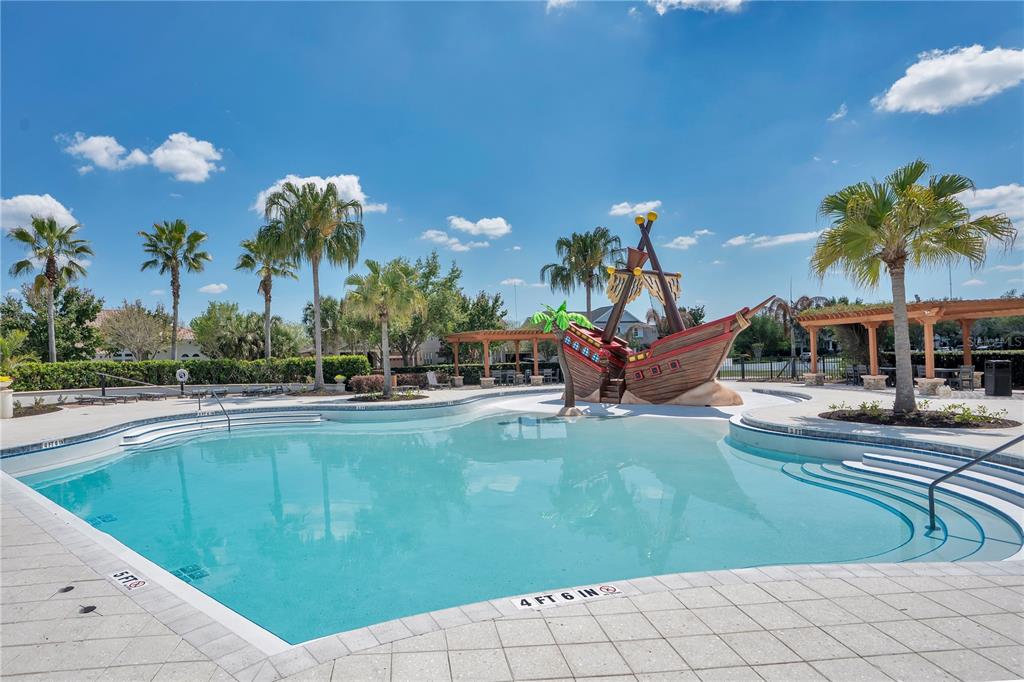 13541 Circa Crossing Drive Lithia, FL 33547 - Photo 39 of 52 a swimming pool with outdoor seating and yard