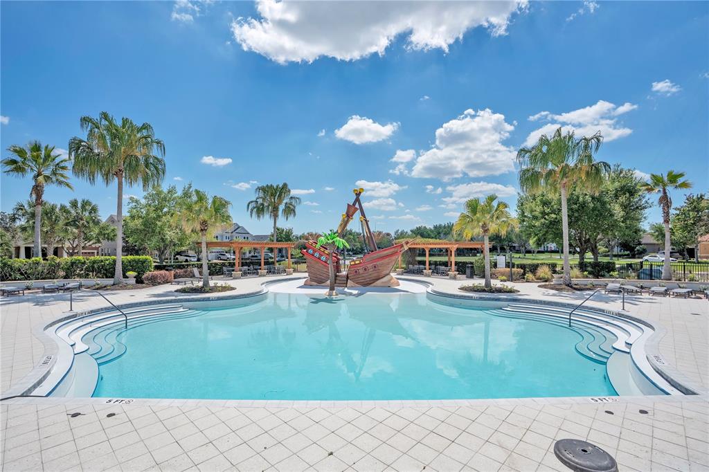13541 Circa Crossing Drive Lithia, FL 33547 - Photo 41 of 52 a view of a swimming pool and lounge chairs
