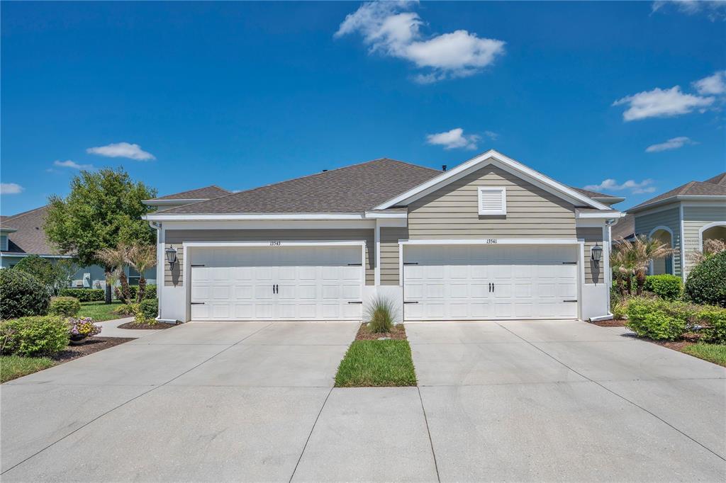 13541 Circa Crossing Drive Lithia, FL 33547 - Photo 50 of 52 a view of garage and yard