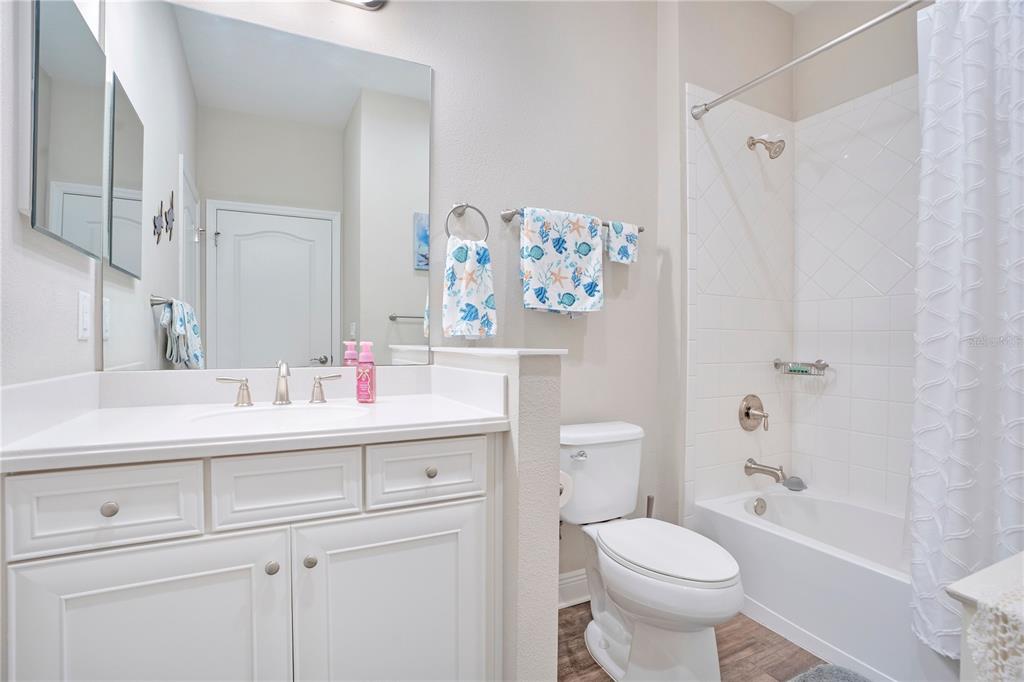 13541 Circa Crossing Drive Lithia, FL 33547 - Photo 8 of 52 a bathroom with a sink toilet and shower
